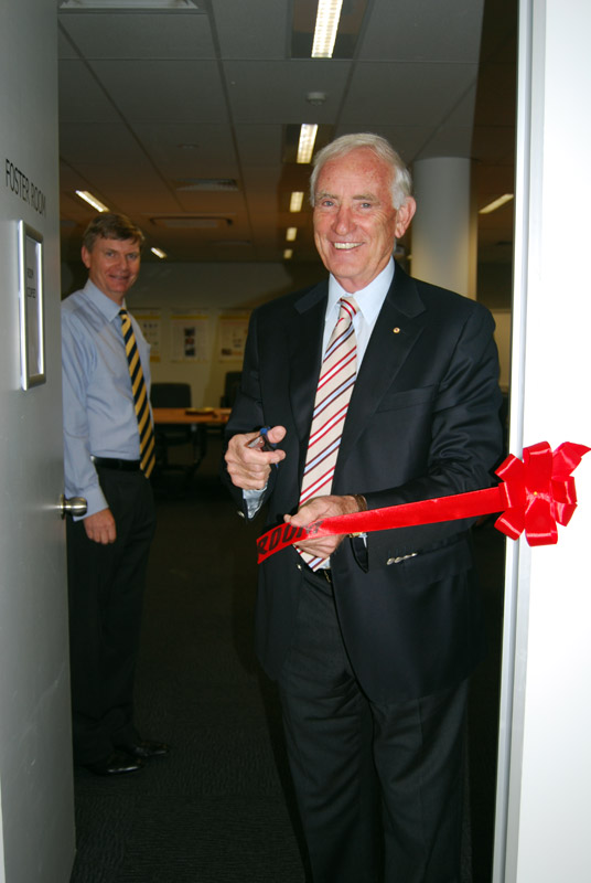Cutting the ribbon to the Foster Room - Len Foster, with Stuart Ellis.