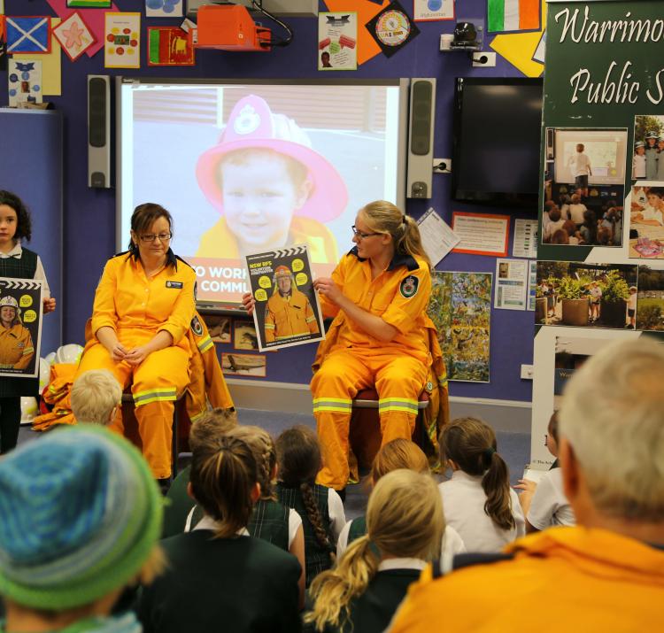 RFS personnel using the new guide at Warrimoo Public School. Photo Ben Shepherd, NSW RFS