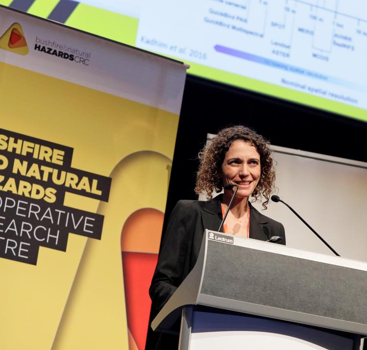 Dr Marta Yebra presenting her fire science in Perth.