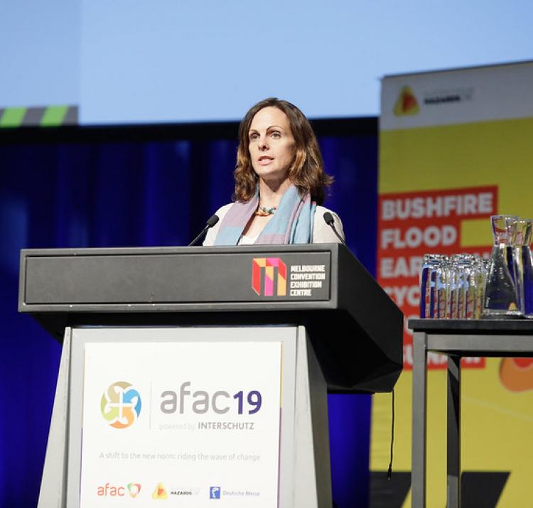 Dr Mika Peace presenting at the AFAC19 conference.