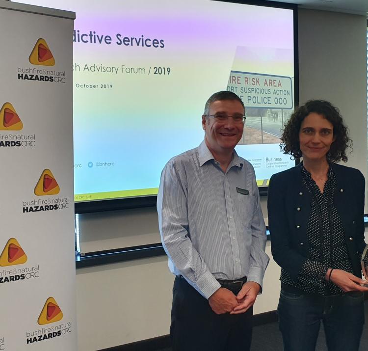 Dr Richard Thornton (left) presenting Dr Marta Yebra (middle) with the 2019 Outstanding Achievement in Research Utilisation award for her research that she has done alongside lead end-user Dr Adam Leavesley (right).