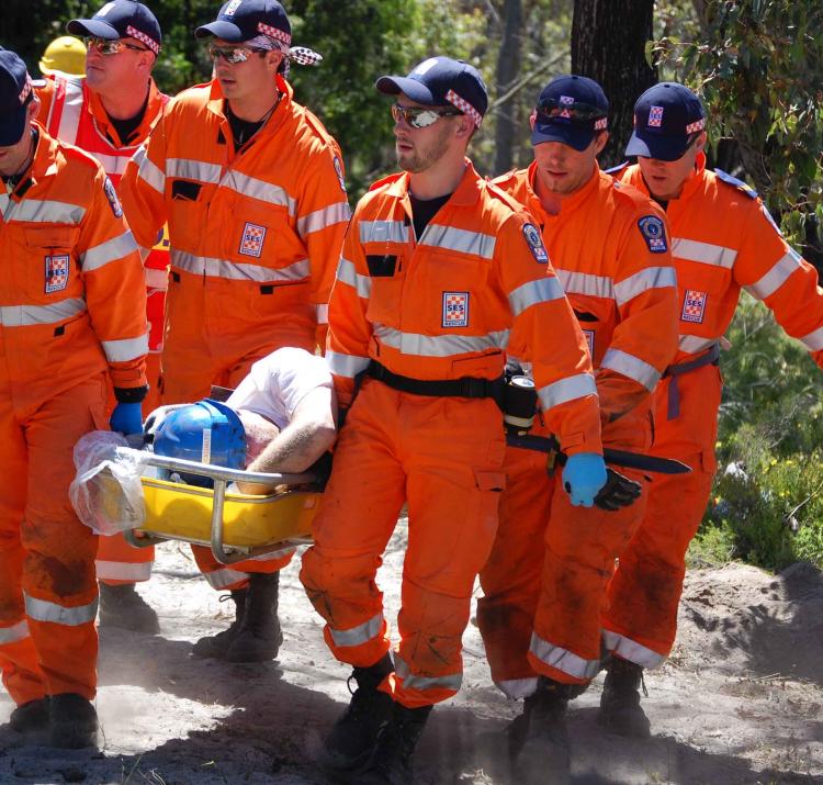 SES volunteers performing a rescue in bushland. Photo by ACT SES.