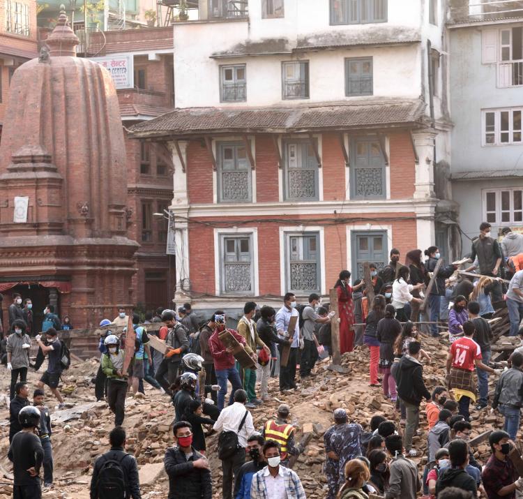 Rescuers clear rubble in the search for survivors in Durbar Square Kathmandu, Nepal, after the first earthquake on 25 April 2015. Photo by Think4Photop, Shutterstock.