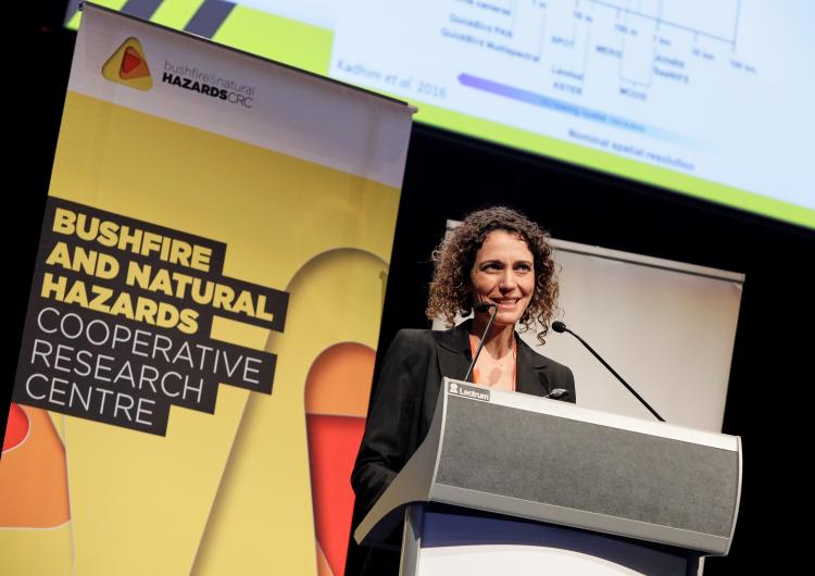 Dr Marta Yebra presenting her fire science in Perth.