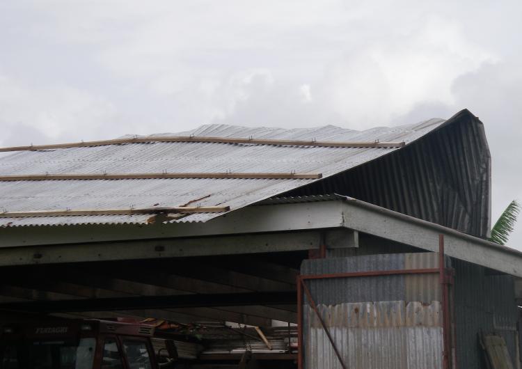 Wind damage to roof from cyclone Ului in Queensland, 2010.