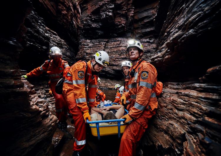 A crew of State Emergency Service volunteers perform a cave rescue.
