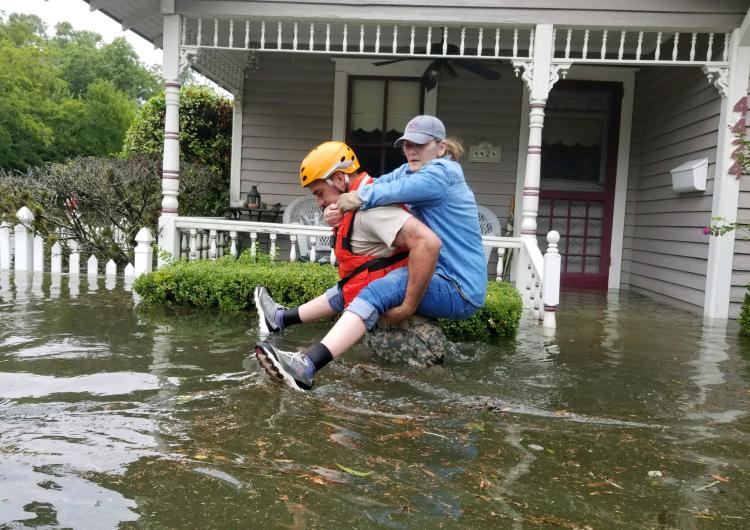 The Texas National Guard rescuing a Houston resident during Hurricane Harvey.