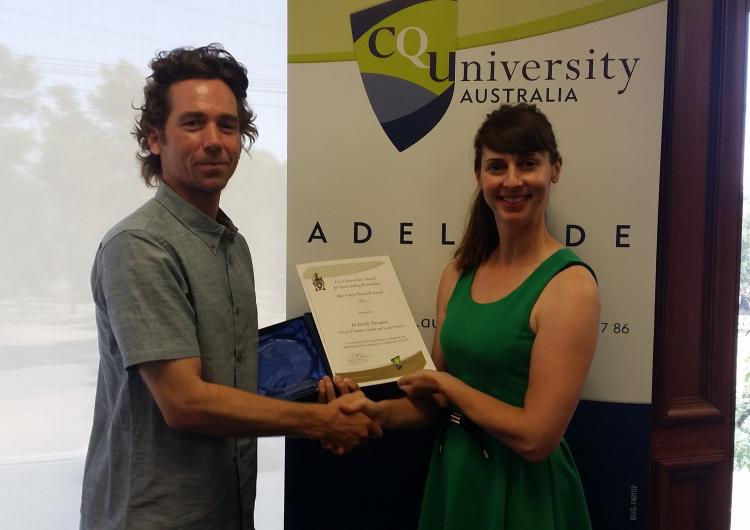 CRC researcher, Dr Kirrilly Thompson receiving her award from CQUniveristy