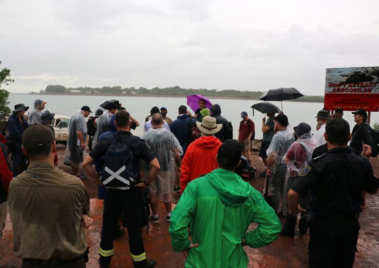 A wet day for the field trip to the Tiwi Islands for the Northern Australia Fire Managers Forum.