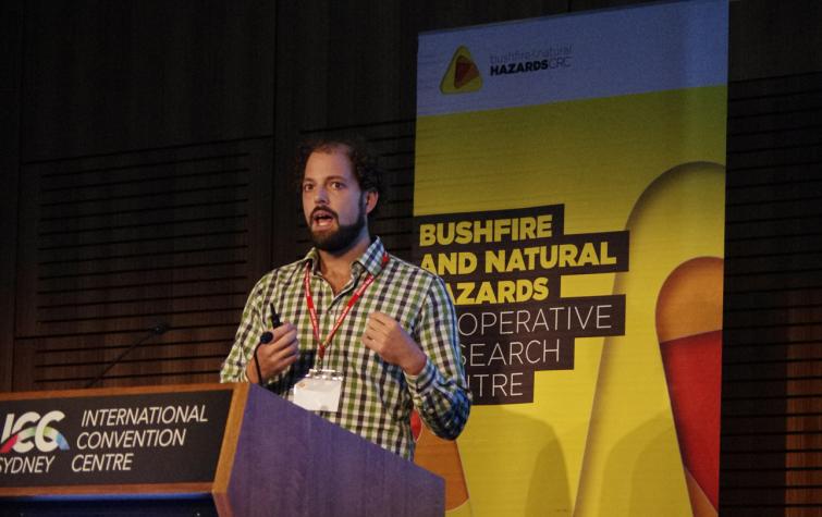 Dr James Furlaud presenting at the International Association of Wildland Fire’s Fire Behaviour and Fuels conference in 2019.