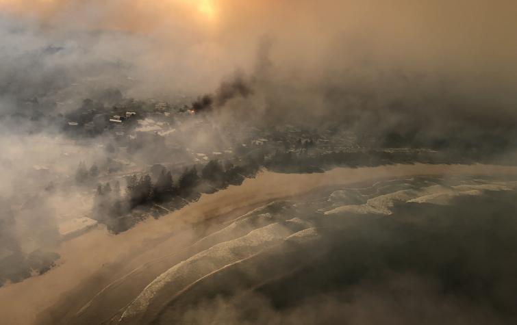 Tathra during the bushfire. Photo: Caleb Keeney, Timberline Helicopters. 