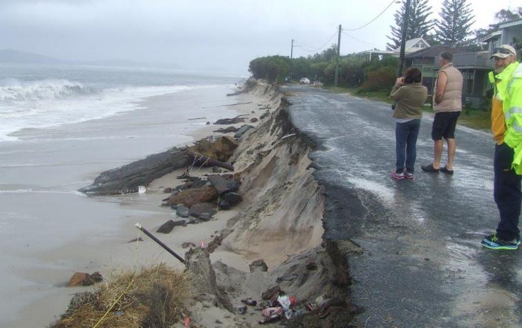 Coastal erosion from a storm surge.