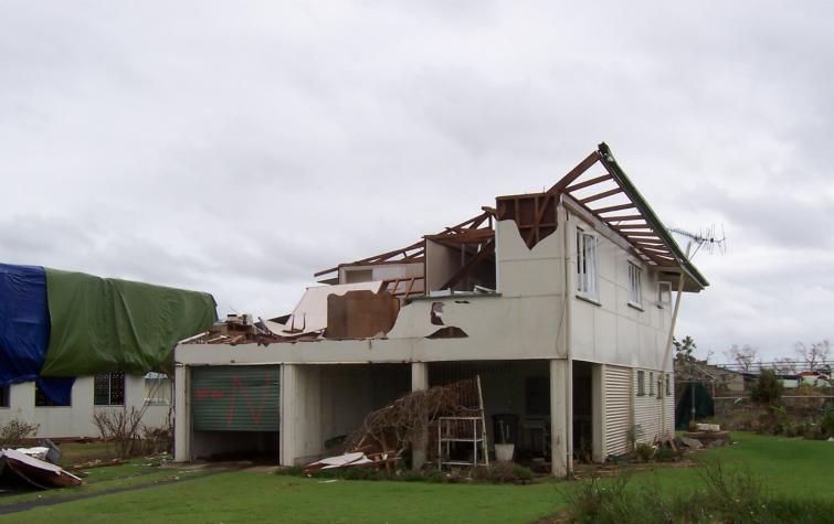 Wind induced damage to a legacy house, TC Yasi. 