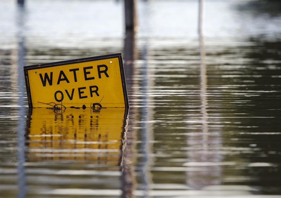 A 'water over road' sign at Rockhampton, Queensland. Photo: Rex Boggs