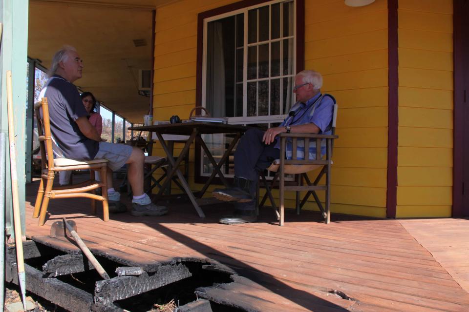 Interviewing residents after the 2013 Coonabarabran fire. Photo: Brydie O'Connor NSW RFS