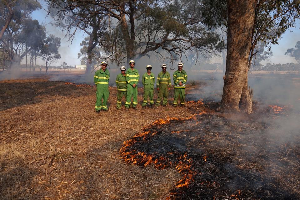 Dr Timothy Neale (left), with Karen Patterson, Harley Douglas, Andrew Saunders, Amos Atkinson and Mick Bourke at djandak wi (healthy fire) burn on Dja Dja Wurrung Country. 
