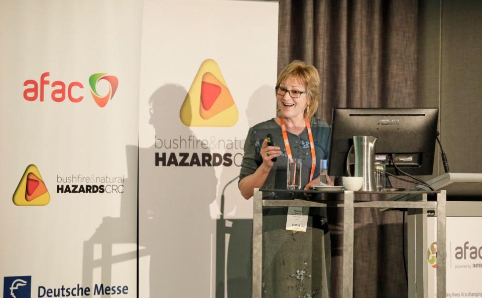 PhD student Heather Bancroft presenting her research on the mental health of Australian firefighters at AFAC18 powered by INTERSCHUTZ.