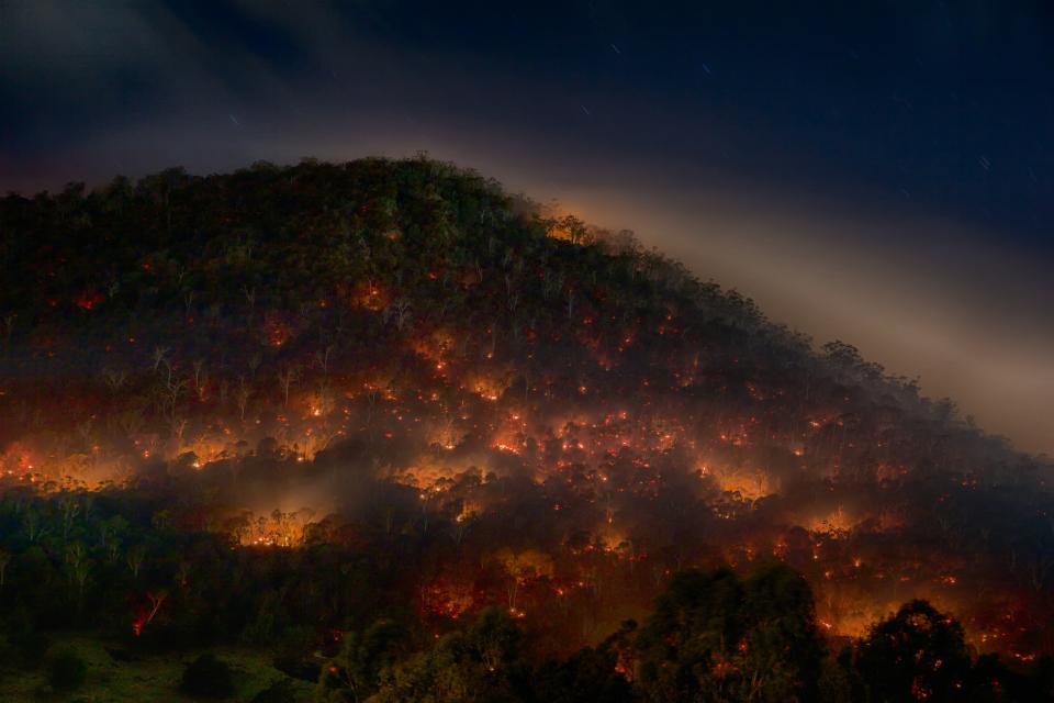A prescribed burn at night. Photo: Mike Rowe (CC BY-NC 2.0)