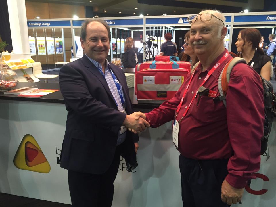 RAPP Australia's Roger Buckle presents Stephen Phillips with the first aid kit.