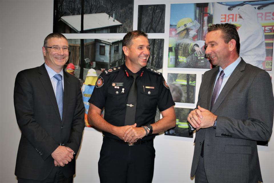 Craig Crawford MP, (right) Qld Minister for Fire and Emergency Services, with Richard Thornton and Mike Wassing (QFES)