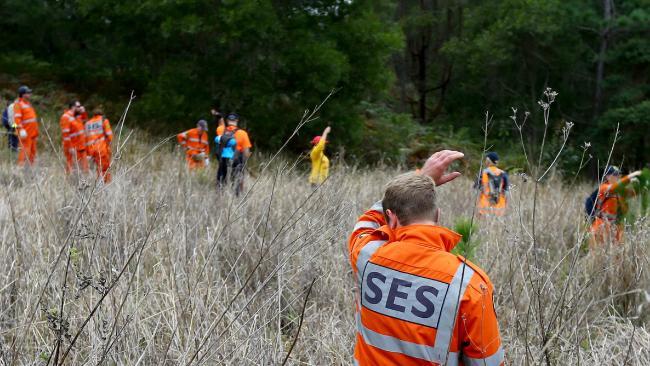 SES volunteers undertaking a search.