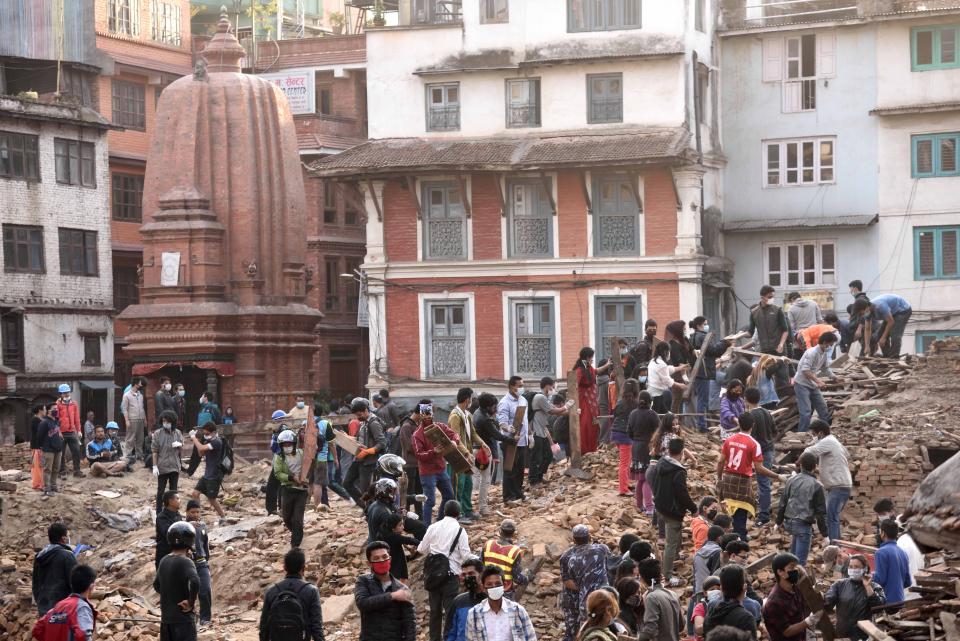 Rescuers clear rubble in the search for survivors in Durbar Square Kathmandu, Nepal, after the first earthquake on 25 April 2015. Photo by Think4Photop, Shutterstock.