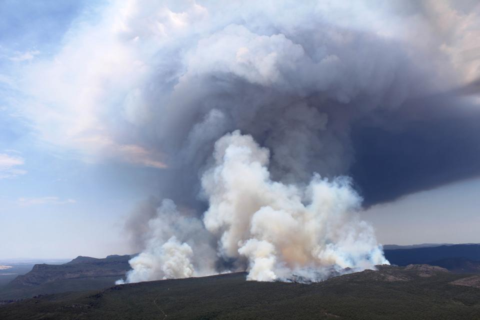 A large smoke plume from the 2014 Grampians bushfire. Photo: Wayne Rigg, CFA